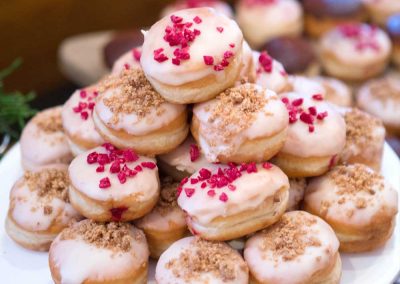 Custom doughnuts on a plate for an event