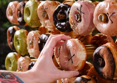 A variety of doughnuts on a doughnut wall