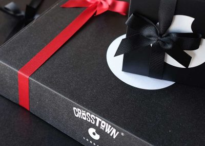 Black and white Crosstown delivery boxes